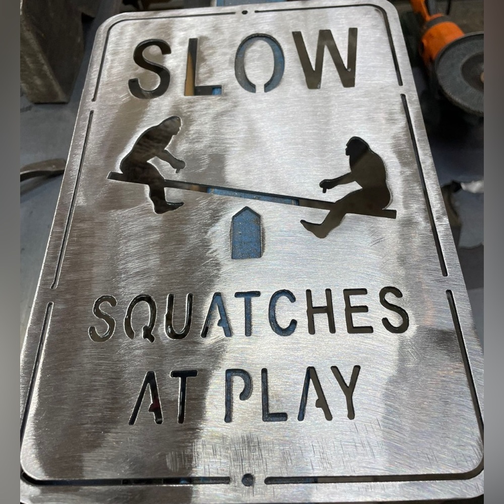 Slow Sasquatch at Play Metal Sign